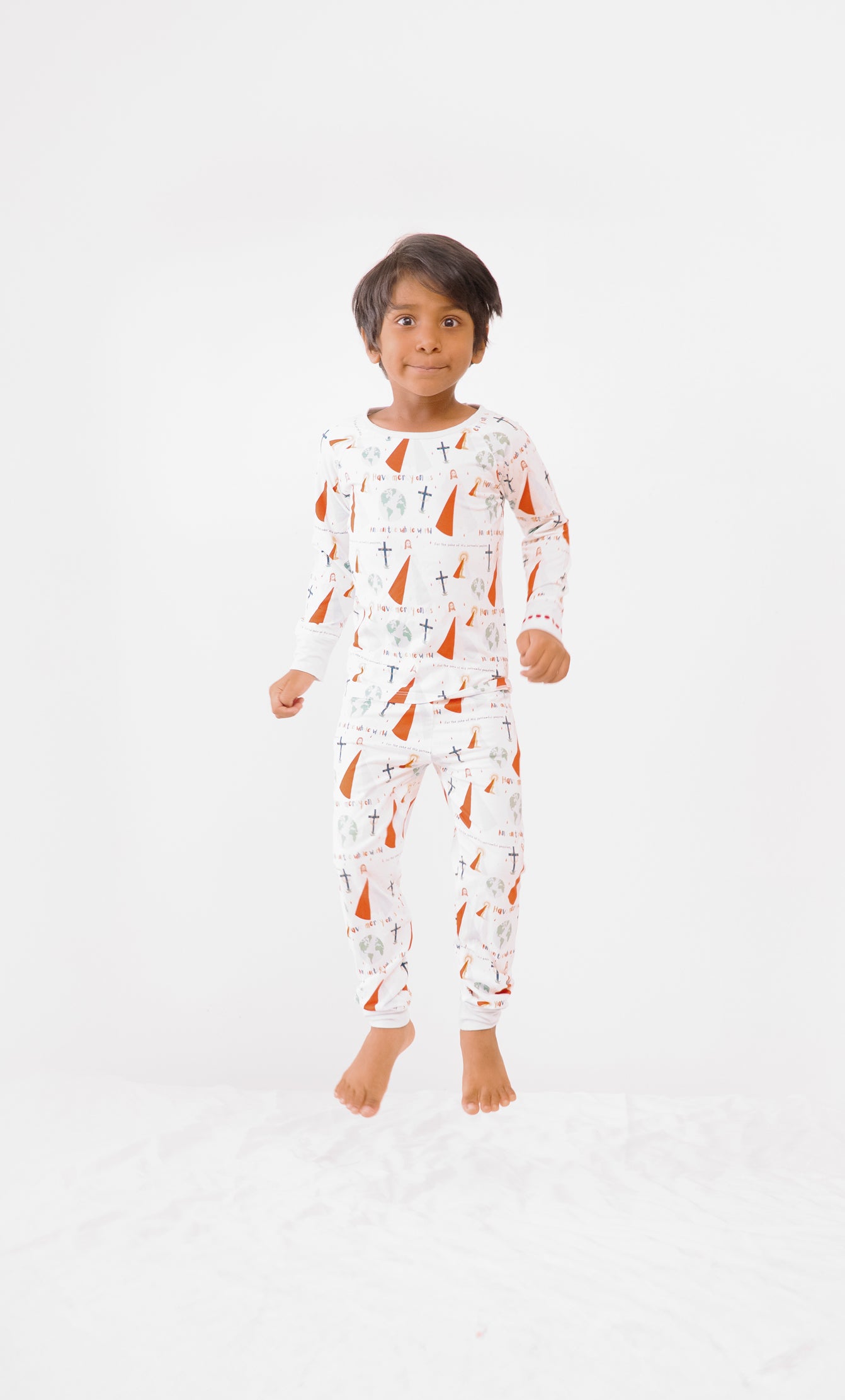 Boy wearing Divine Mercy two-piece pajamas