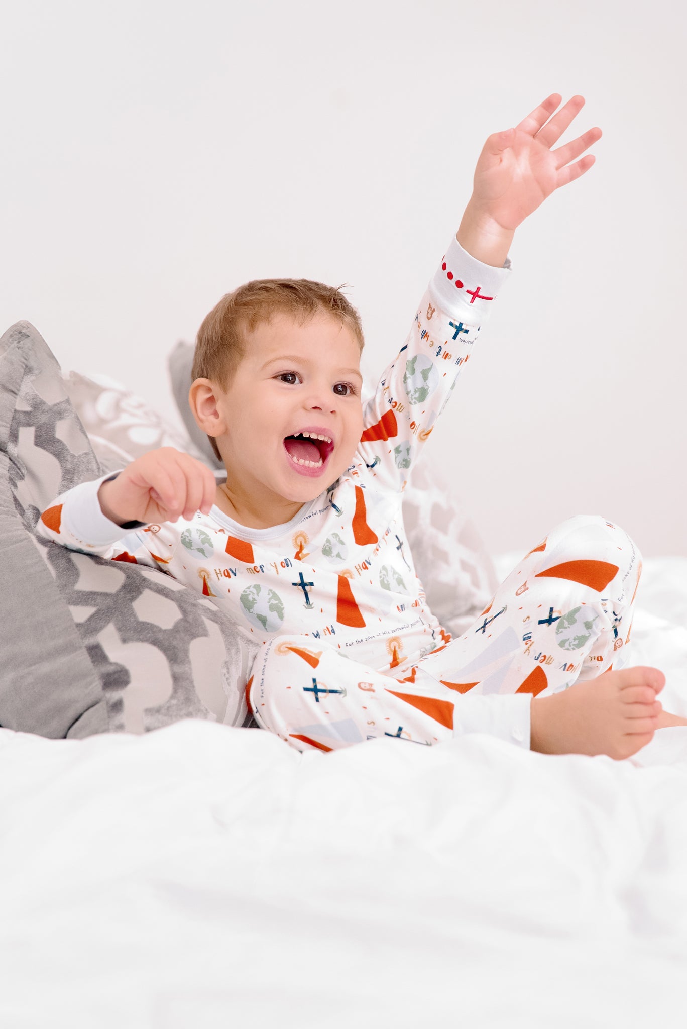 Boy wearing Divine Mercy two-piece pajamas