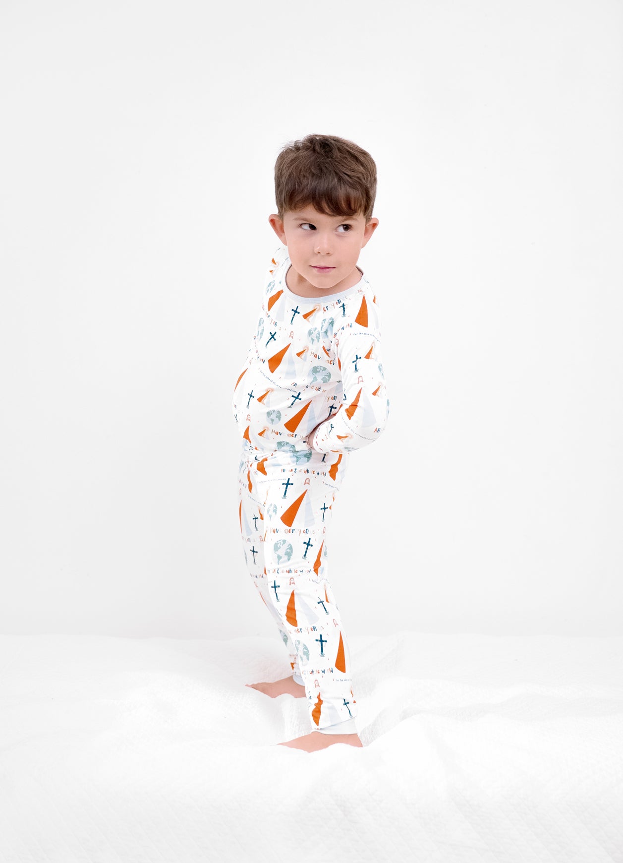Boy wearing Divine Mercy two-piece pajamas