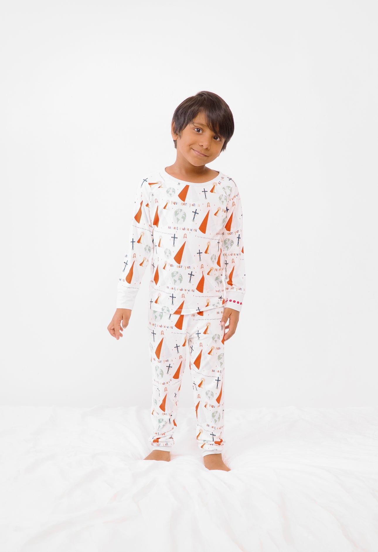 Boy wearing Divine Mercy two-piece pajamas
