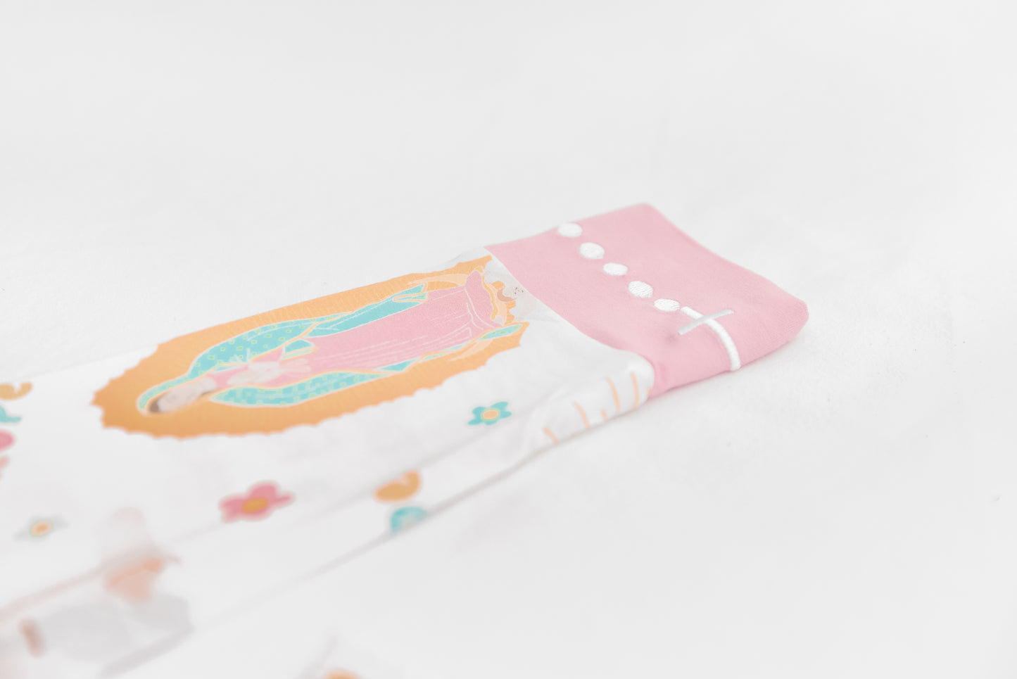 Rosary wrist detail of Our Lady of Guadalupe Catholic girls long sleeve pajamas