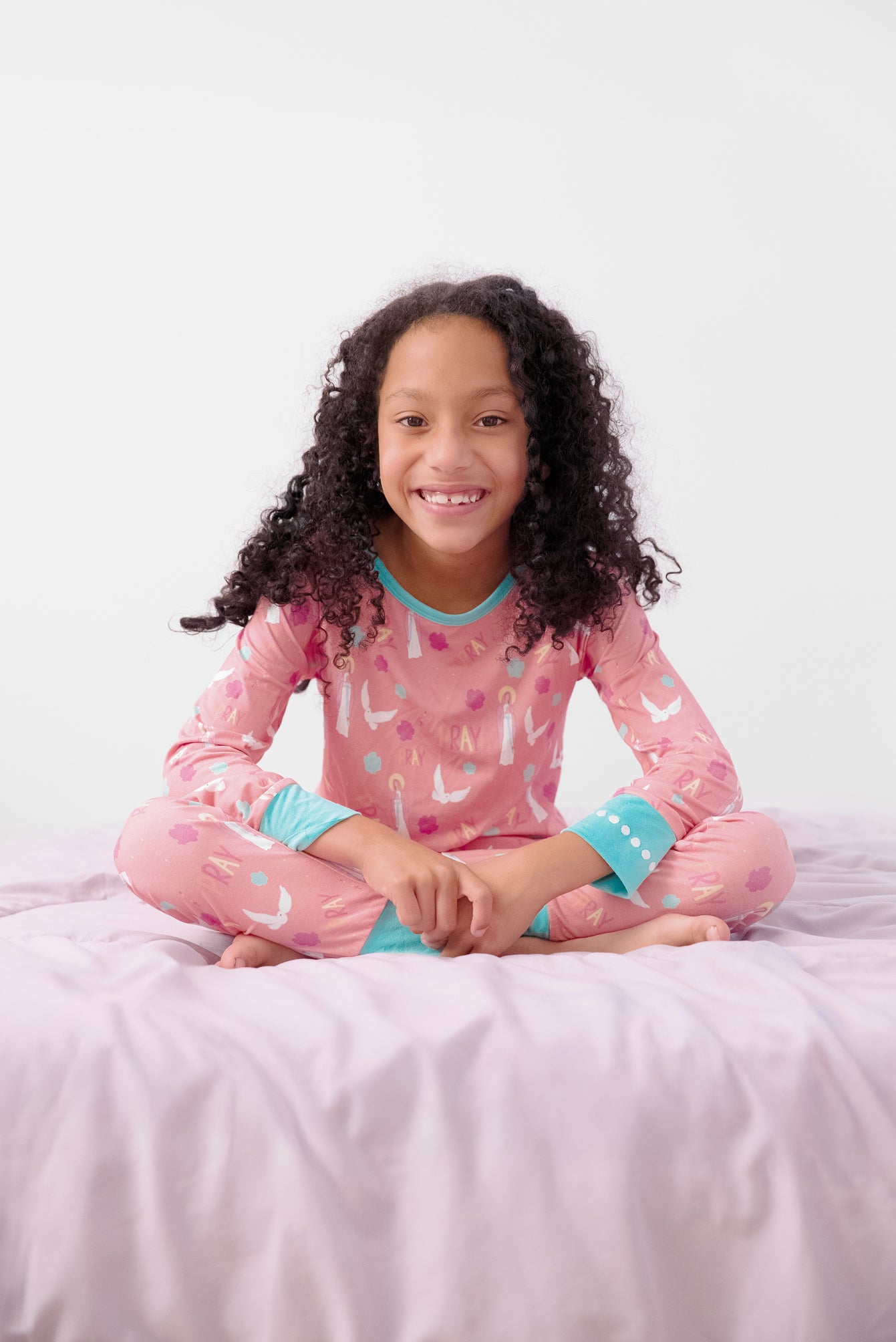 Girl wearing Catholic Pray Pajamas