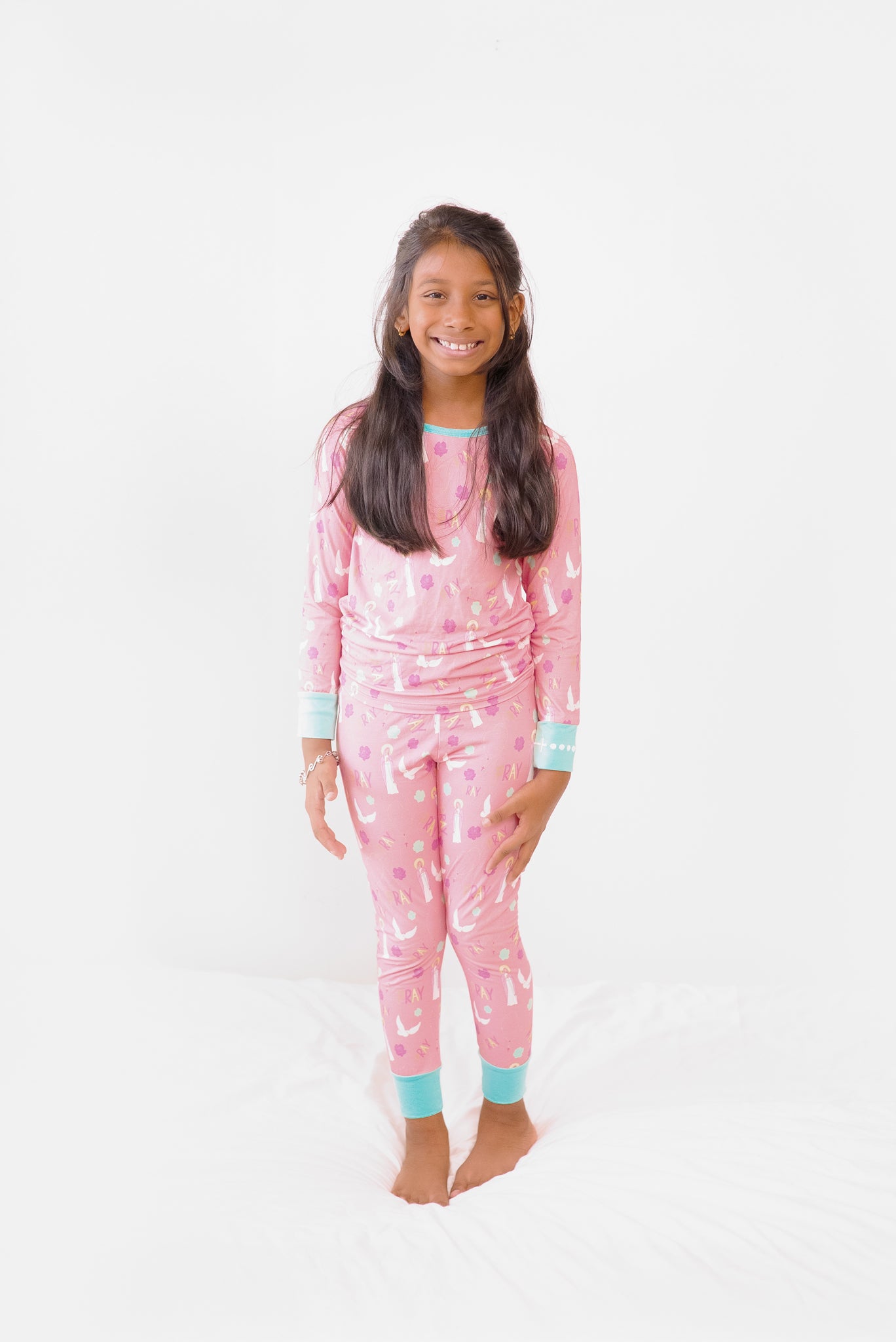 Girl wearing Catholic Pray Pajamas