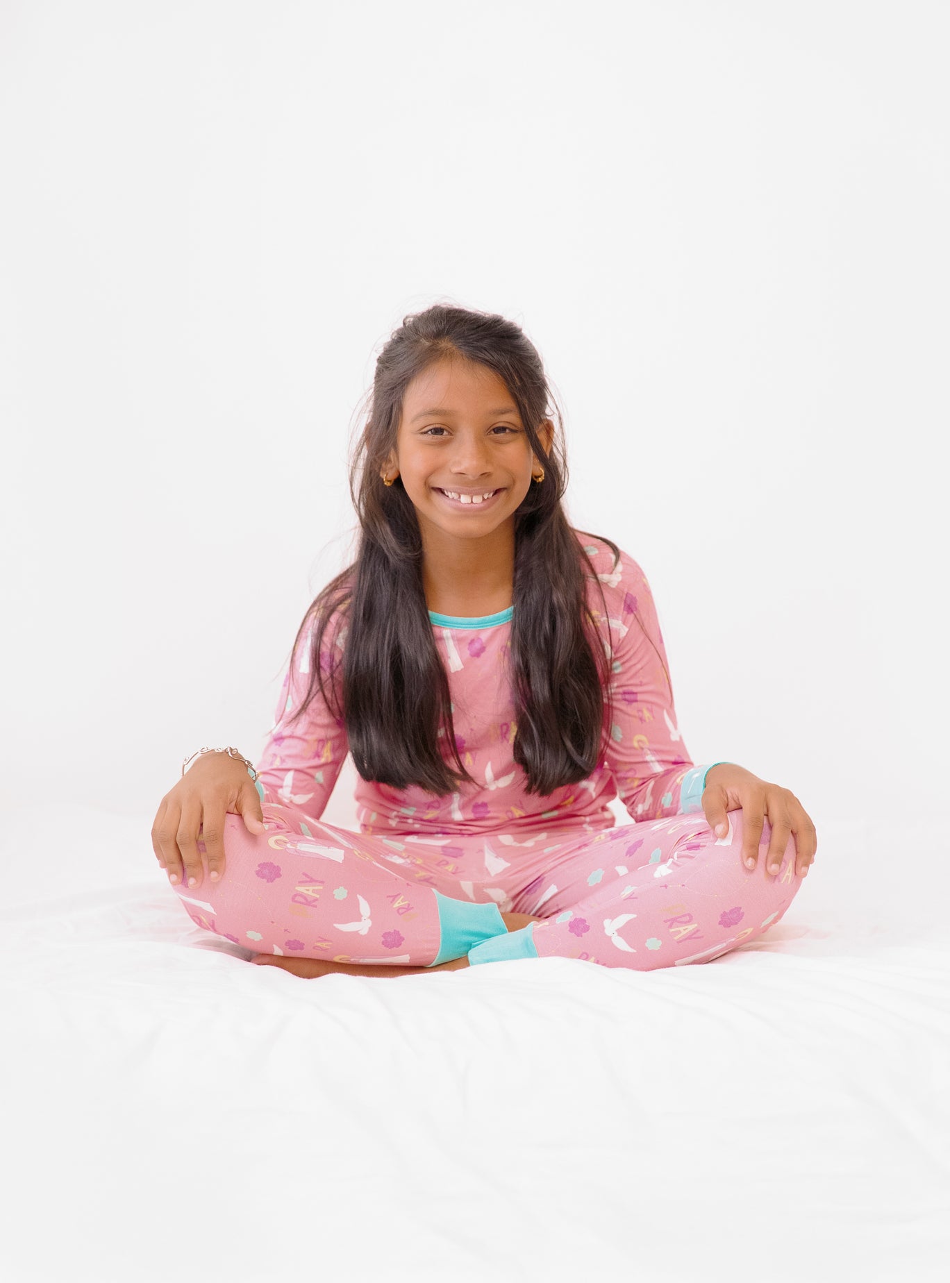 Girl wearing Catholic Pray Pajamas