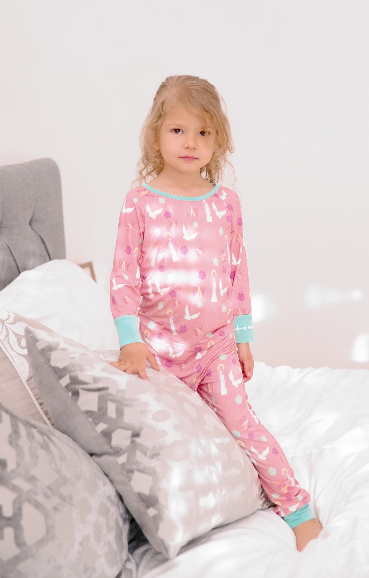 Girl wearing Catholic Pray Pajamas