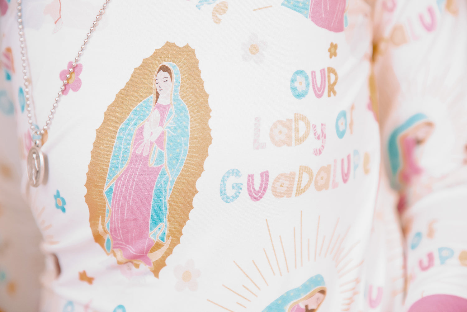 Closeup of Our Lady of Guadalupe on girls pajamas