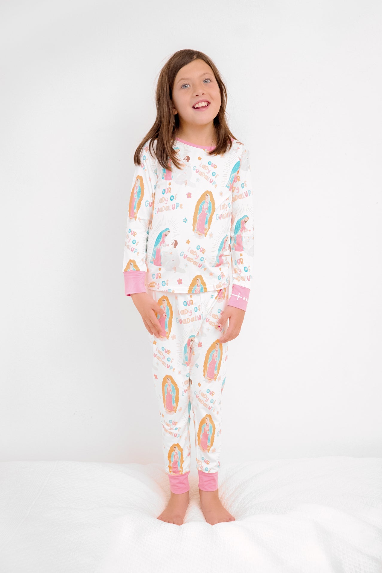 Girl wearing Our Lady of Guadalupe Catholic pajamas