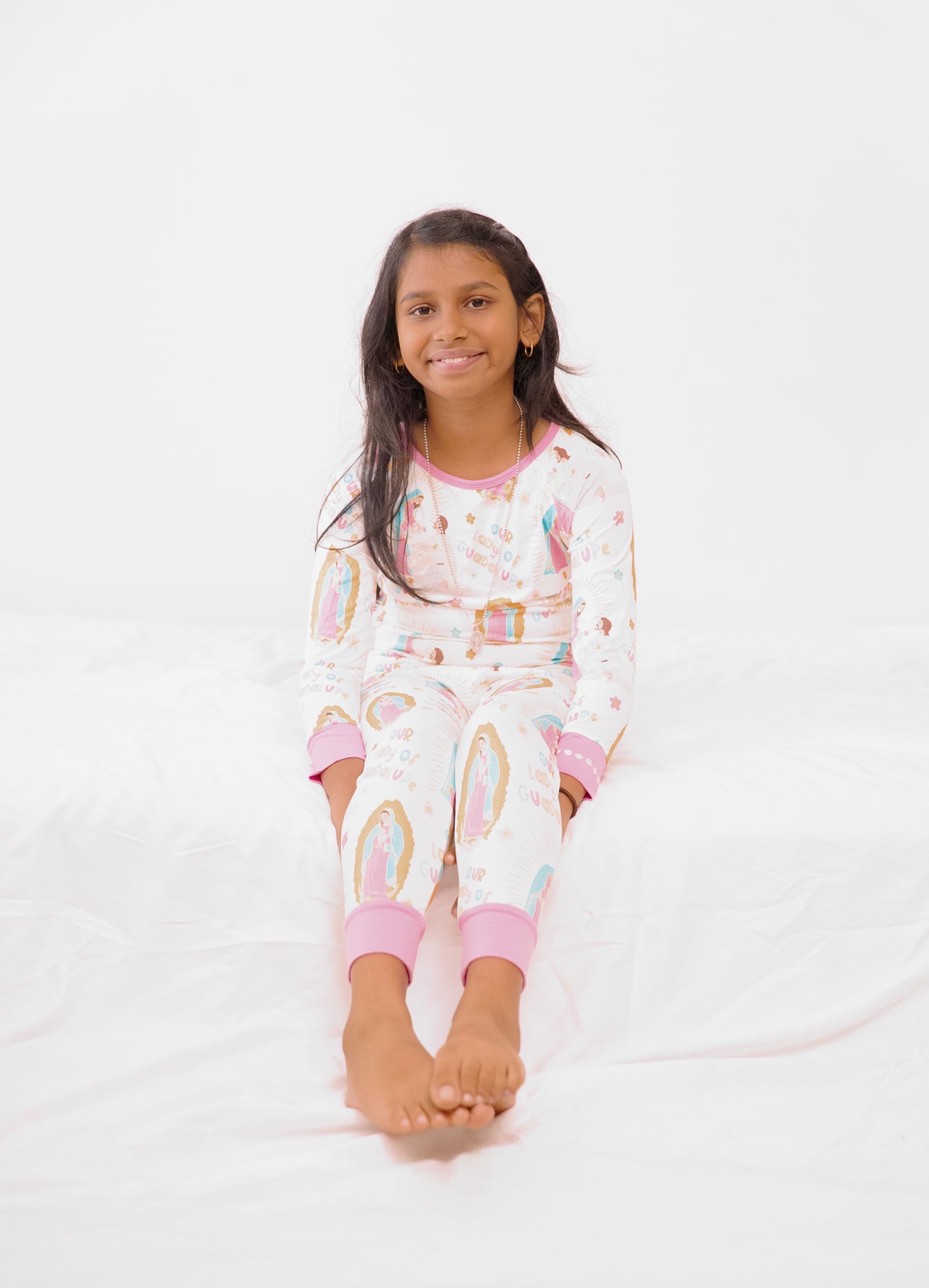 Girl wearing Our Lady of Guadalupe Catholic pajamas