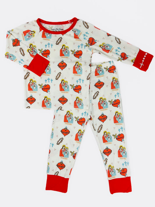 Children's pajama set with a pattern of the Sacred Heart of Jesus and Immaculate Heart of Mary and an embroidered rosary wrist detail