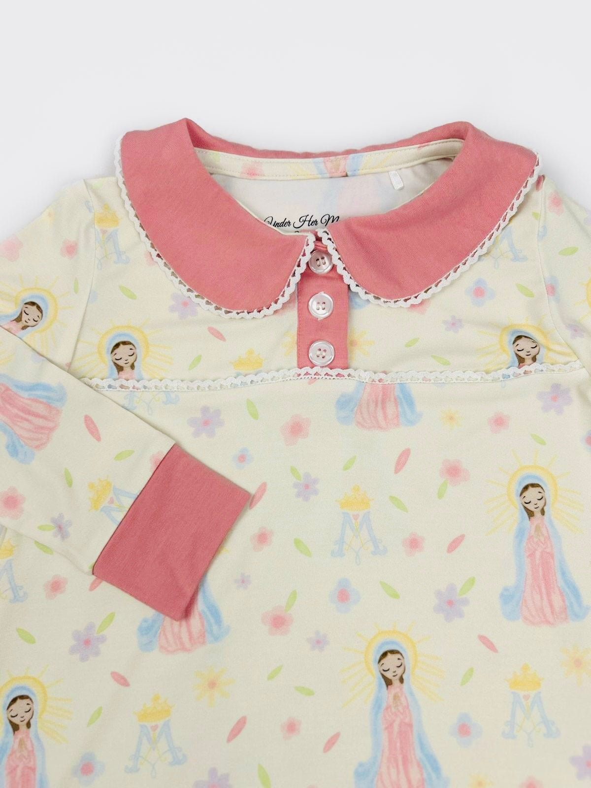 Girls nightgown with Mother Mary print and pink collar, and rosary embroidered wrist detail