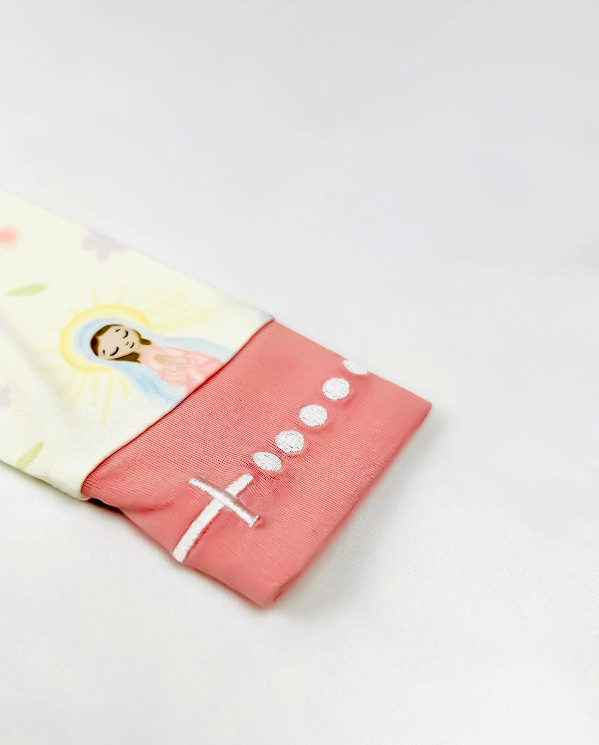 Close up of rosary embroidered wrist detail on Sweet Mary girls nightgown pajamas