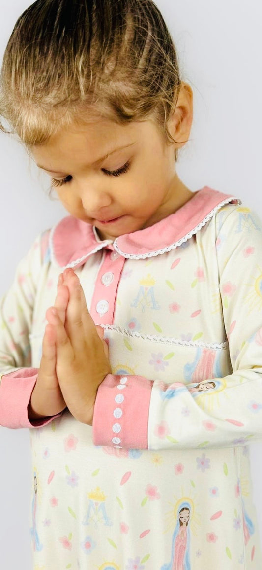 Girl in Sweet Mary rosary nightgown with pink collar and cuffs, praying with hands clasped.